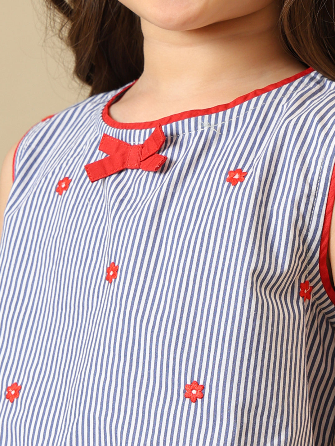 Blue striped girls sleeveless co-ord set with red bow print and matching shorts