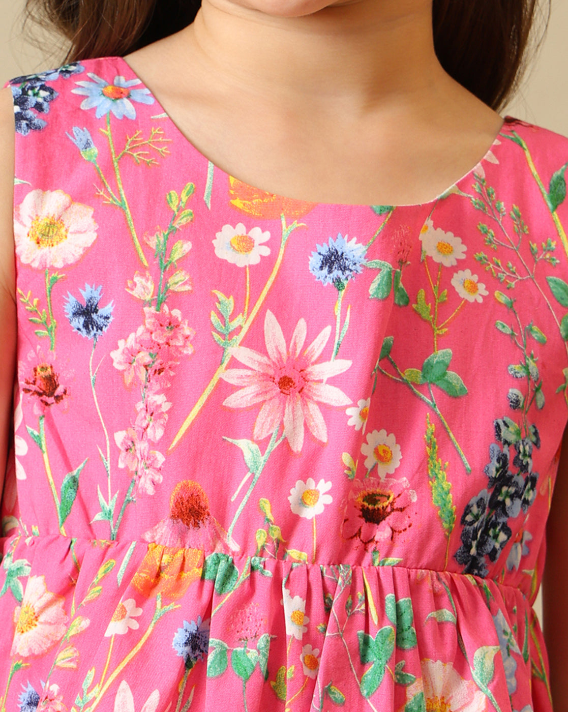 Pink floral printed girls sleeveless fit and flare dress with tiered hem