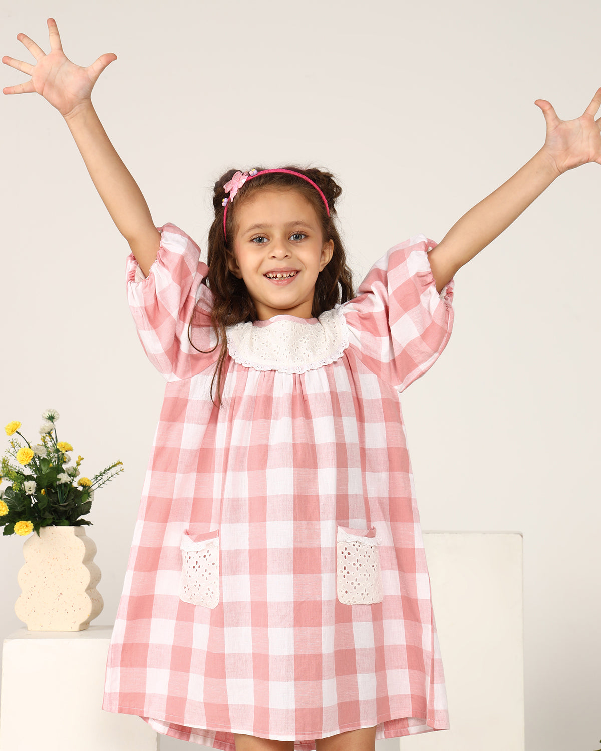 Pink and white checked girls short sleeve top with ruffle detailing