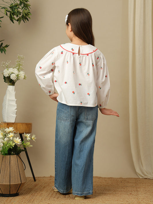 Girls white cotton shirt with red floral embroidery, green leaf detailing, collared neck, button-down front and full sleeves.