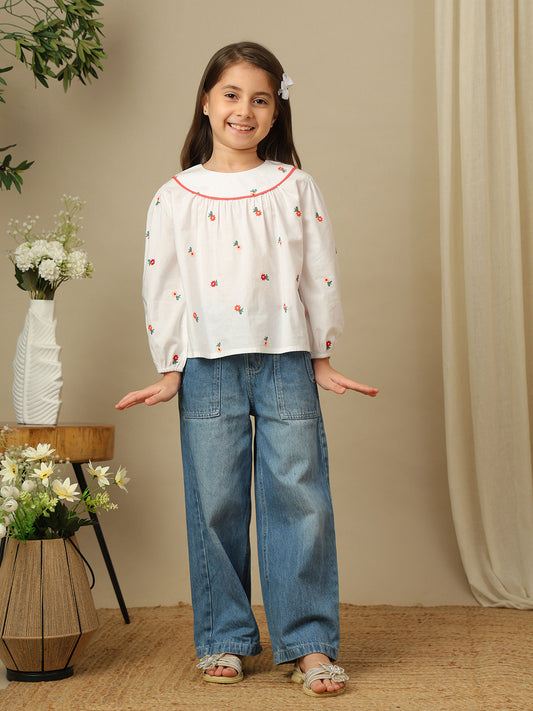 Girls white cotton shirt with red floral embroidery, green leaf detailing, collared neck, button-down front and full sleeves.