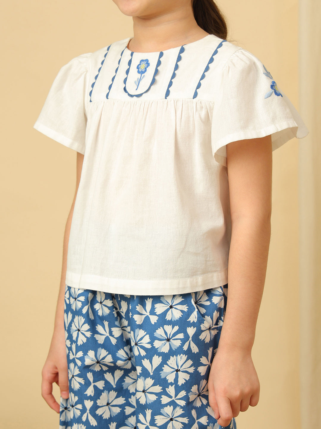 Girls white floral embroidered cotton top with blue floral print wide-leg pants co-ord set