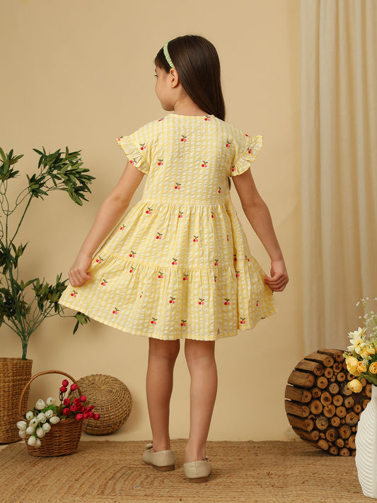 Girls pink gingham checked dress with all-over cherry print, ruffle sleeves and gathered flared silhouette